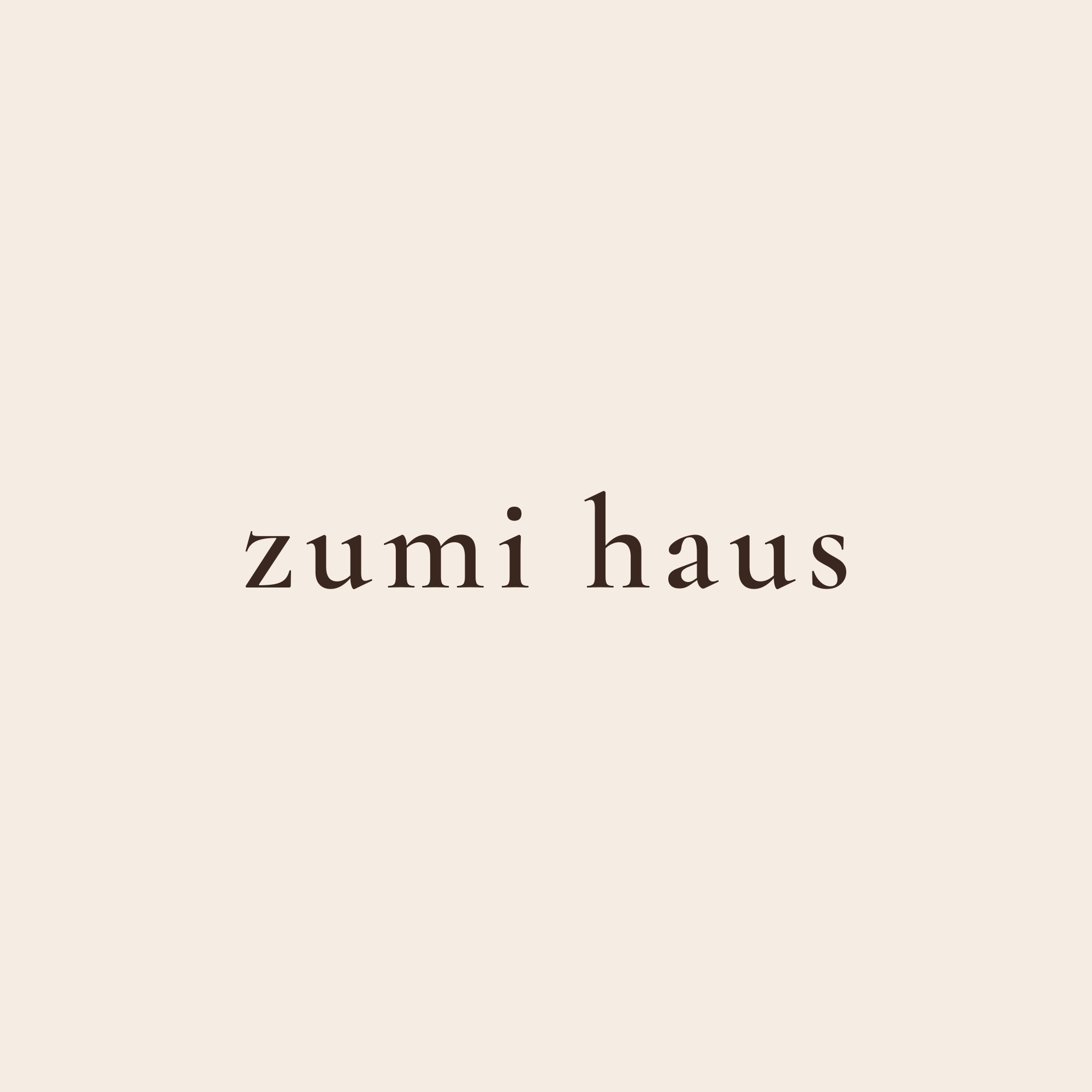 Original zumi haus brand logo, espresso lettering on cream
